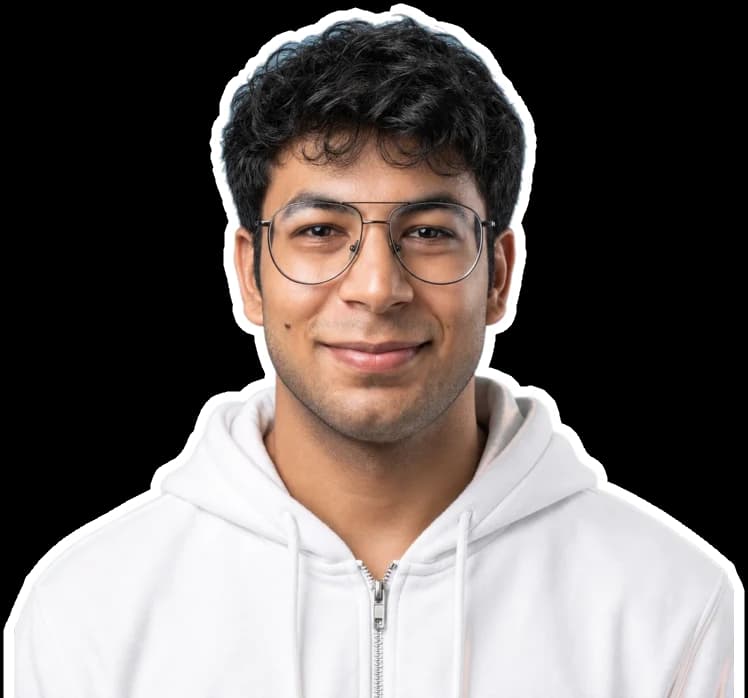 Prince Gupta, smiling, in a white hoodie and glasses